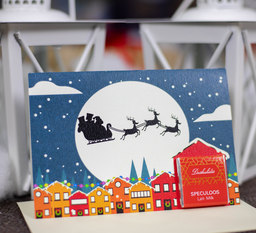 Коледна картичка с плочка шоколад - Празнична нощ